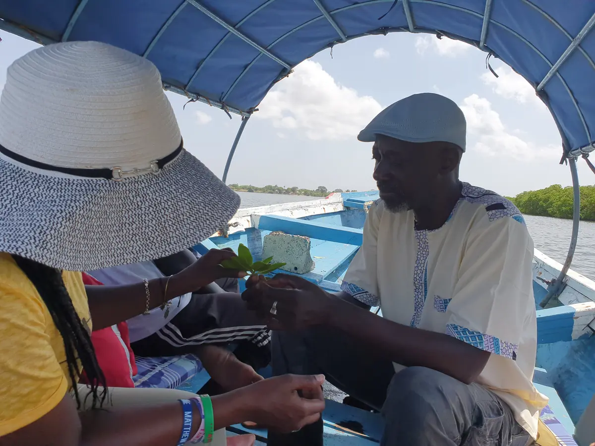 Participants engaging with local artists and makers